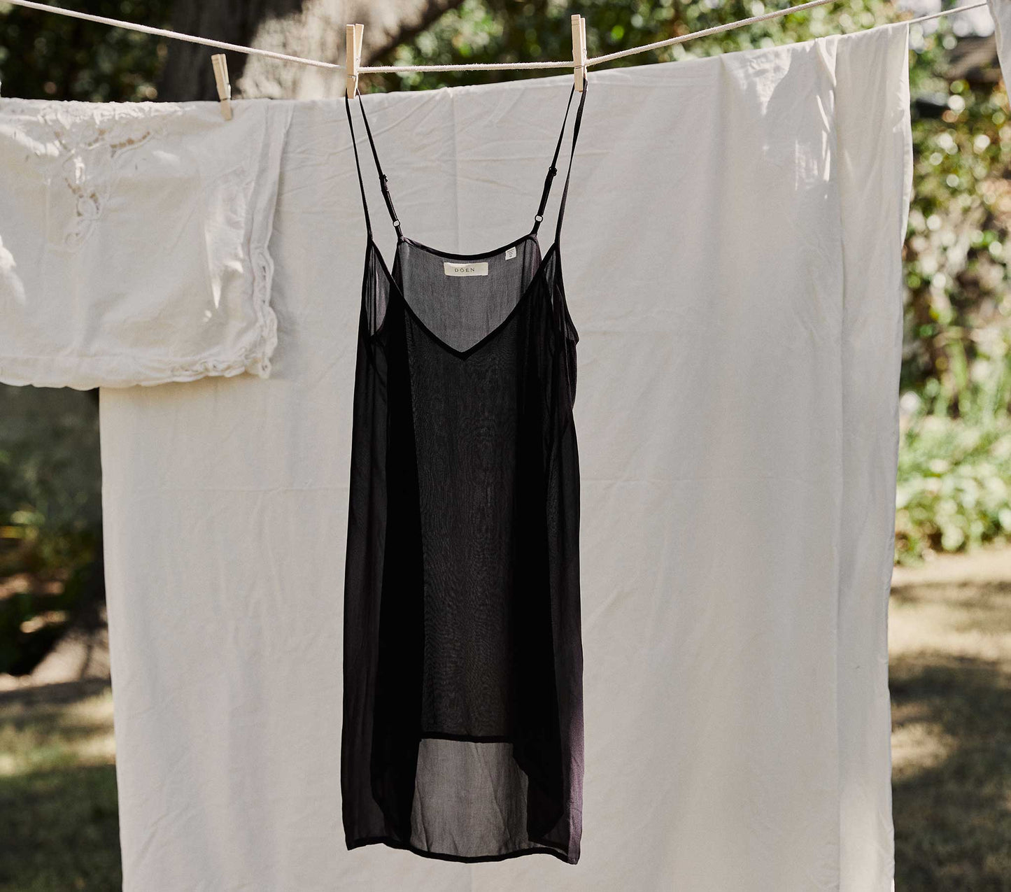 DÔEN Women Short Deep V-Neck Slip - Black