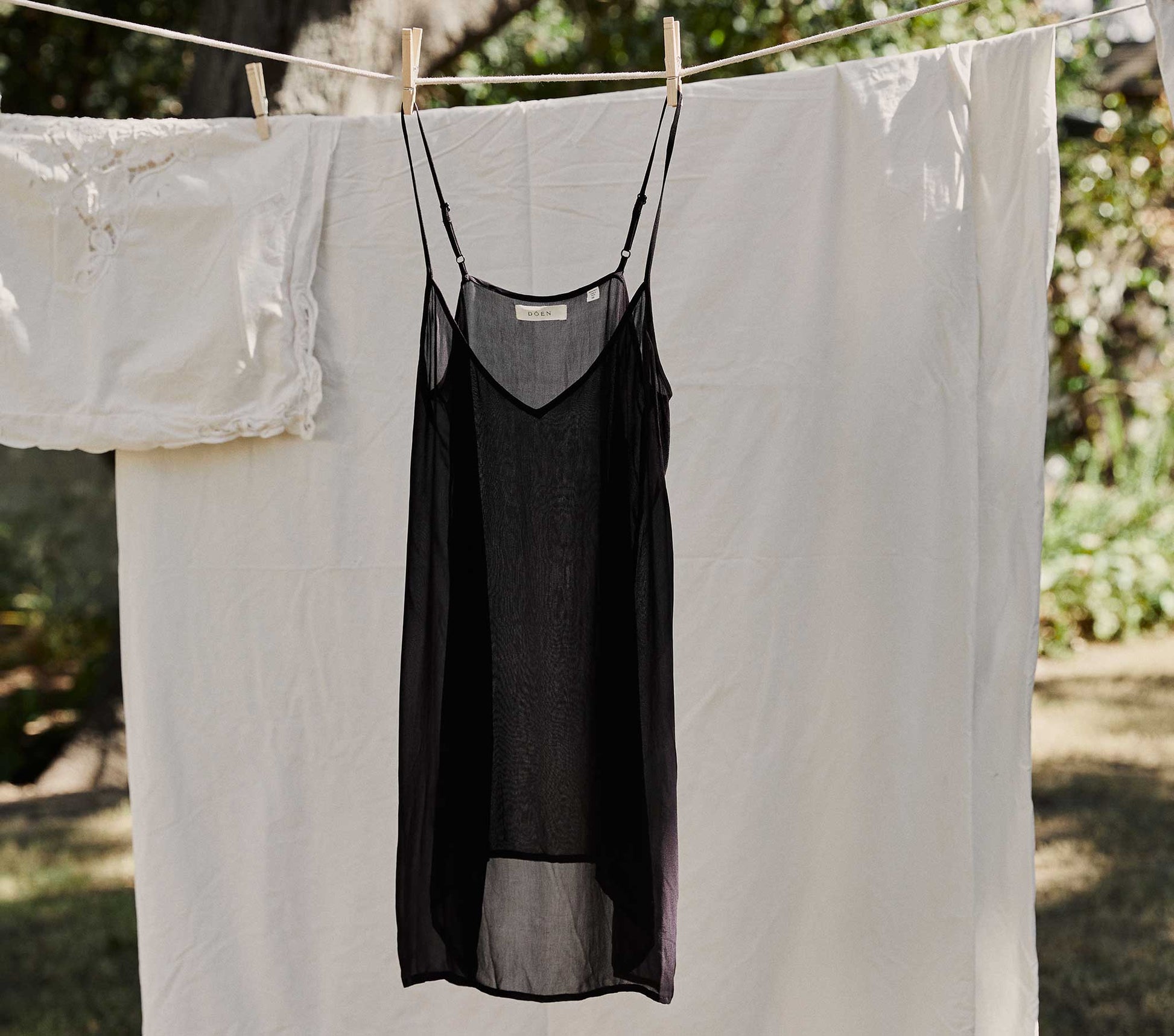 DÔEN Women Short Deep V-Neck Slip - Black