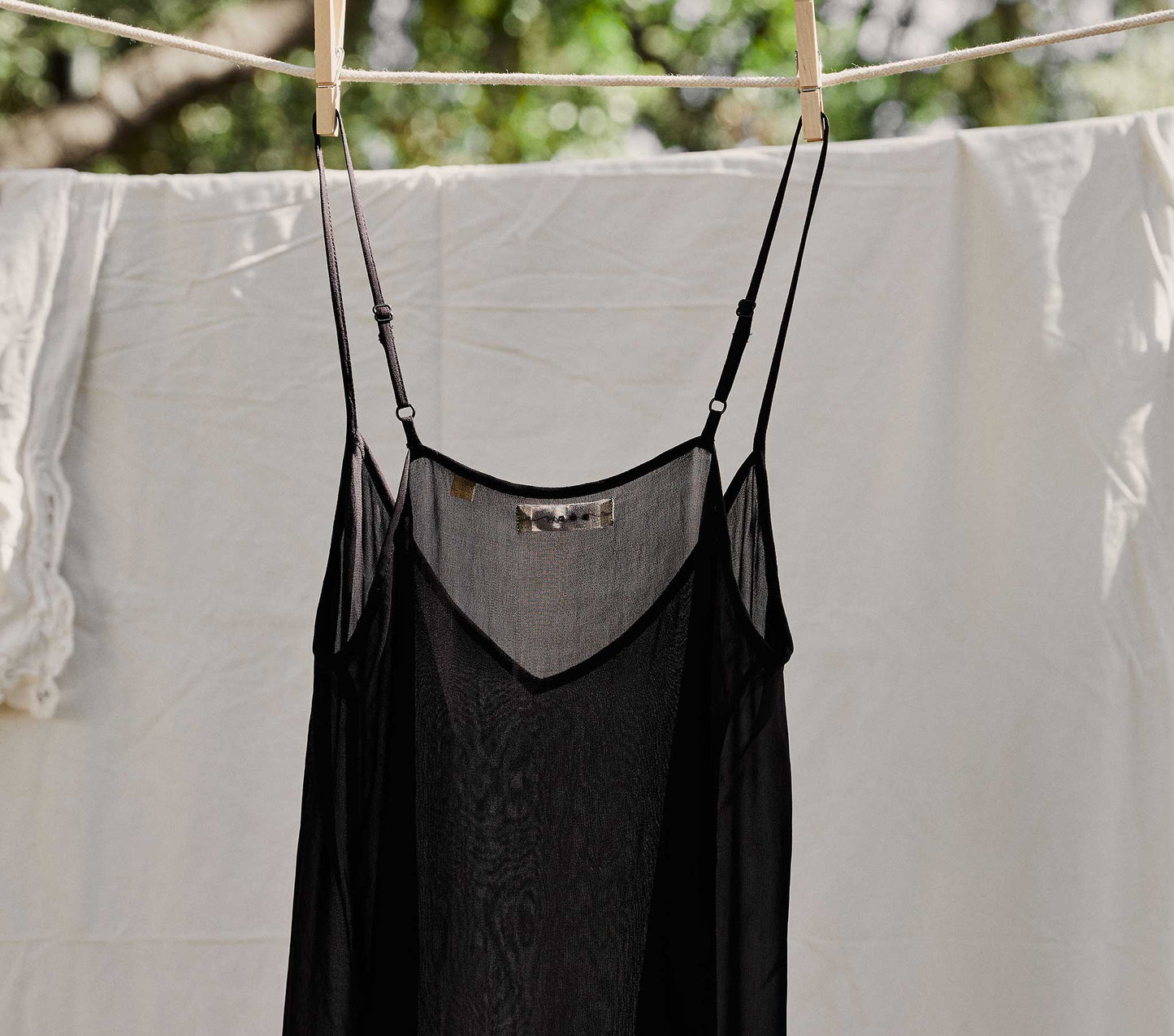 DÔEN Women Short Deep V-Neck Slip - Black