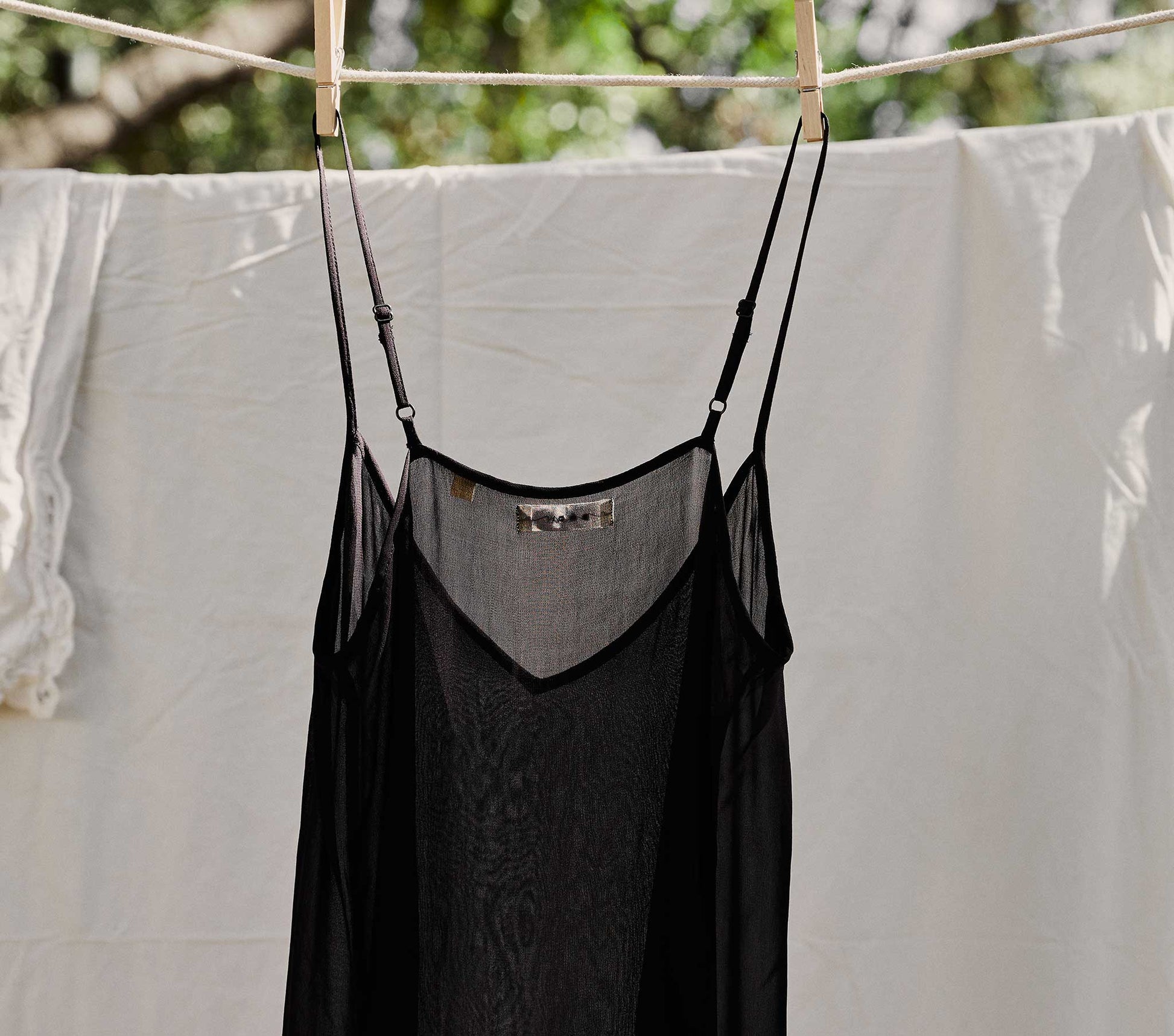 DÔEN Women Short Deep V-Neck Slip - Black