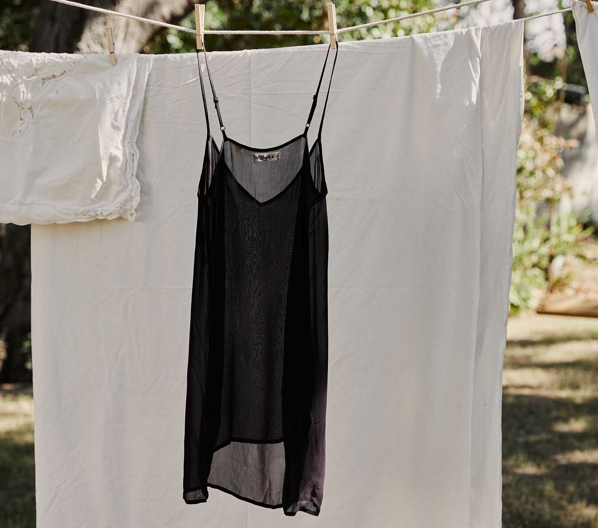 DÔEN Women Short Deep V-Neck Slip - Black